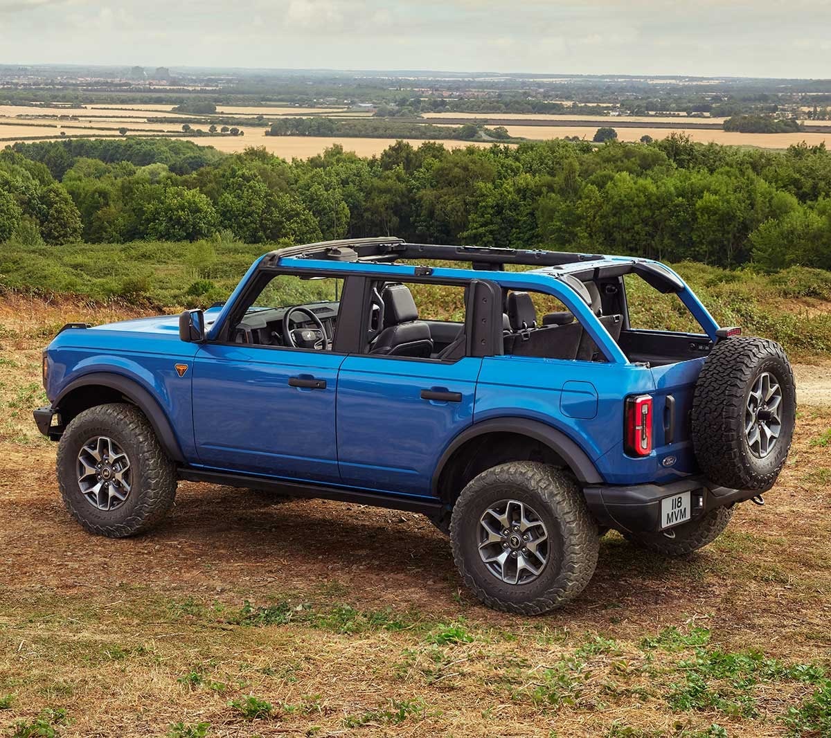 Ford Bronco parked offroad with roof panels removed