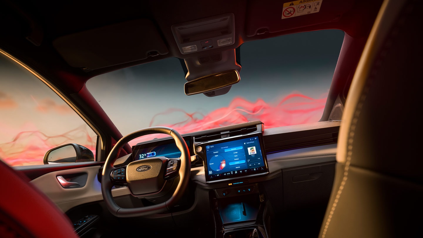 Interiorul Ford Puma Sound Edition prezentând volanul și ecranul de infotainment.
