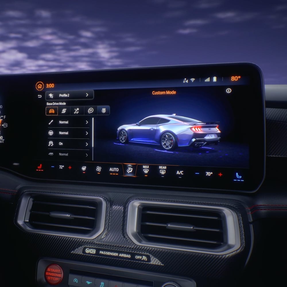 Close up of Ford Mustang dashboard monitor displaying Ford SYNC 4 software.