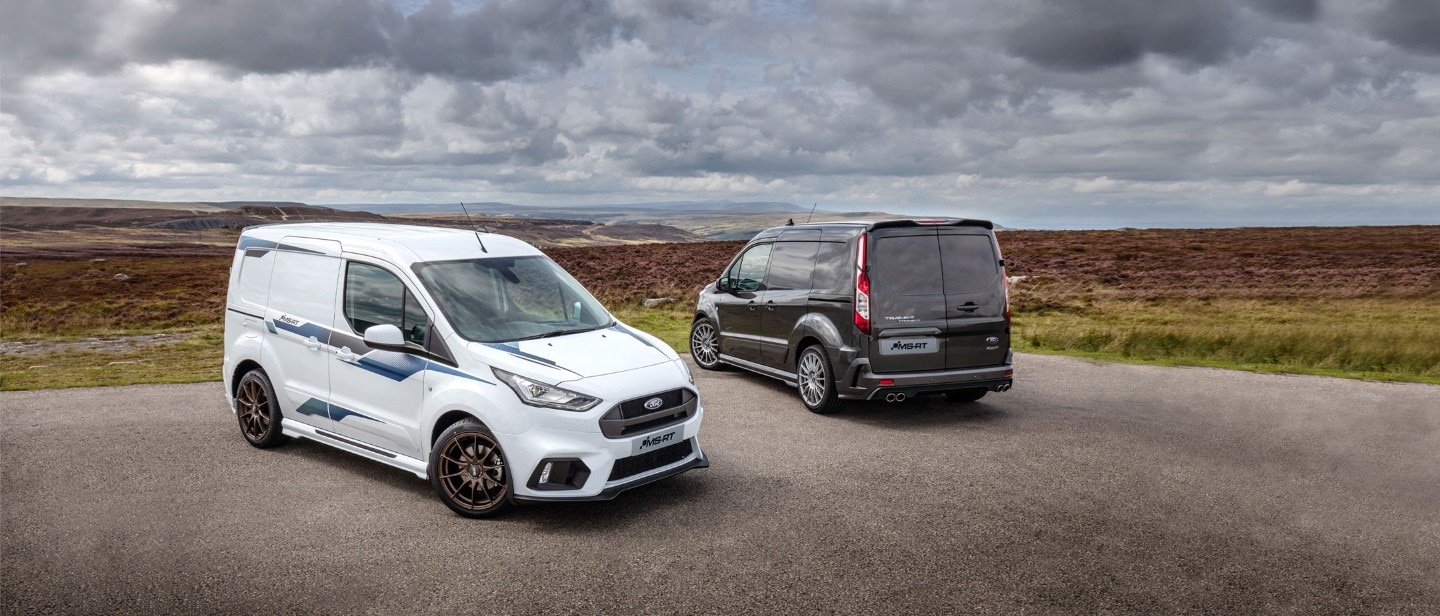 Blue Ford Transit Connect driving