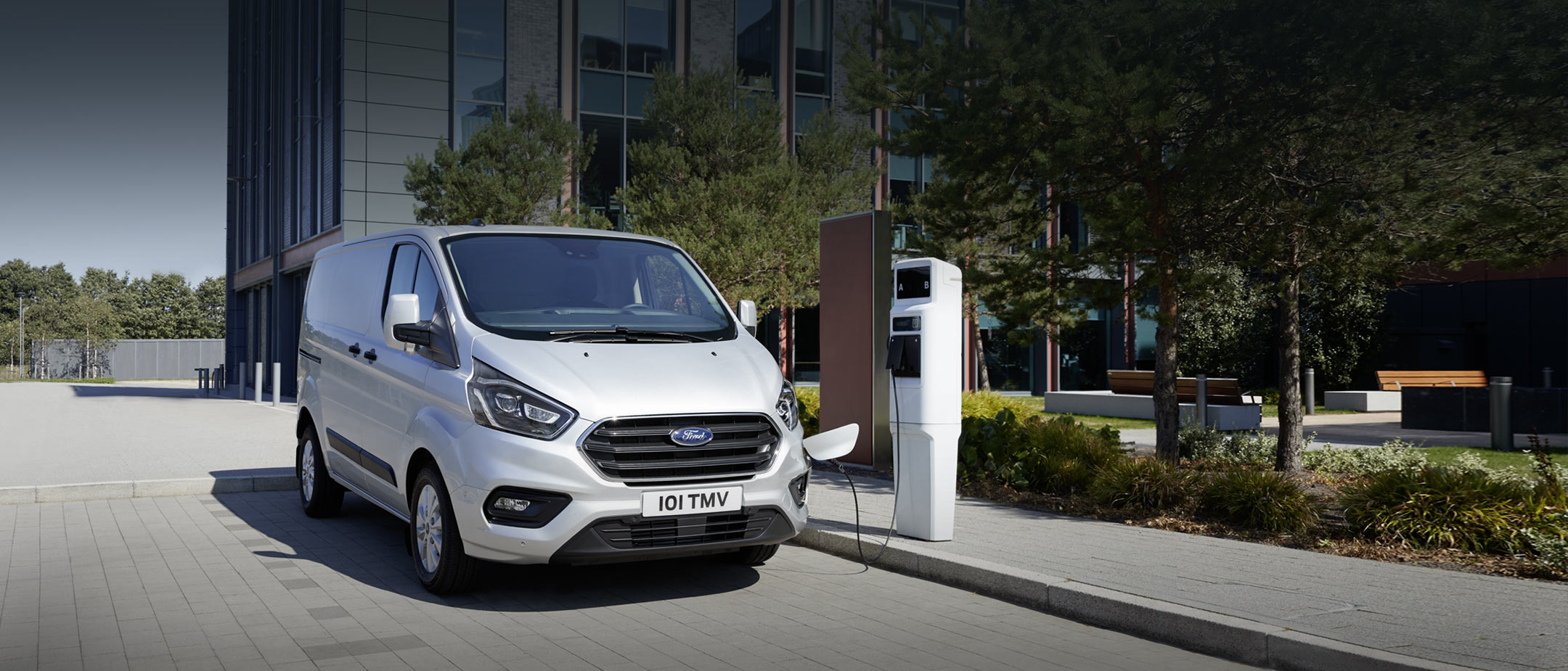 New Ford Transit Custom PHEV being charged from charging point New Ford Transit Custom PHEV being charged from charging point
