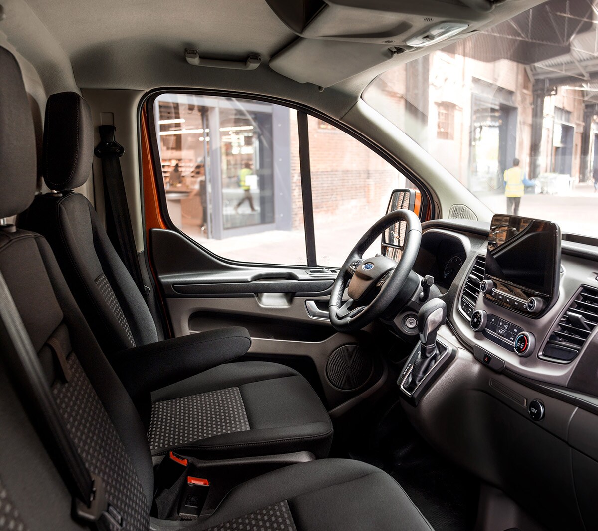 Transit Custom Van interior with seats and steering wheel