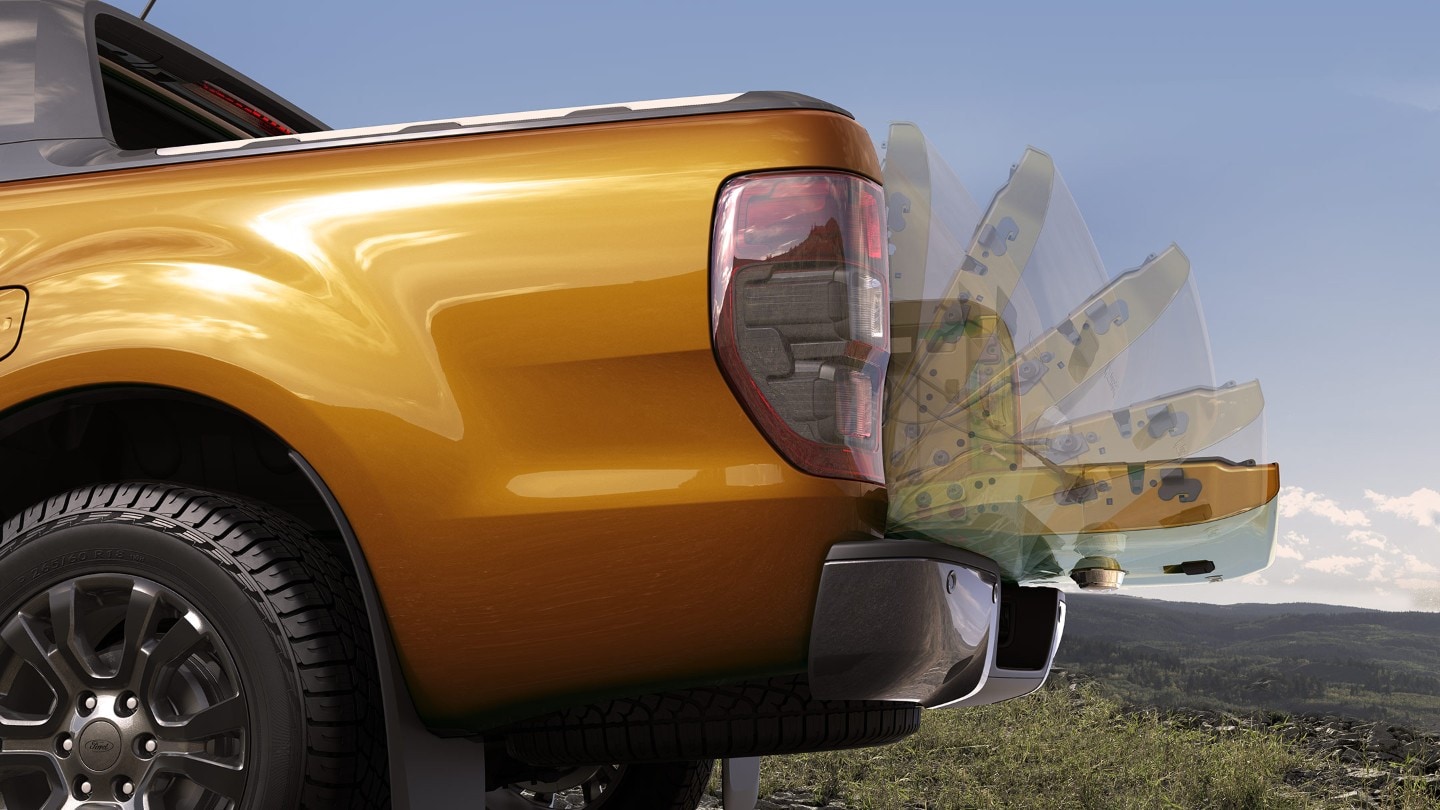 Orange Ford Ranger easy lift tailgate close up 