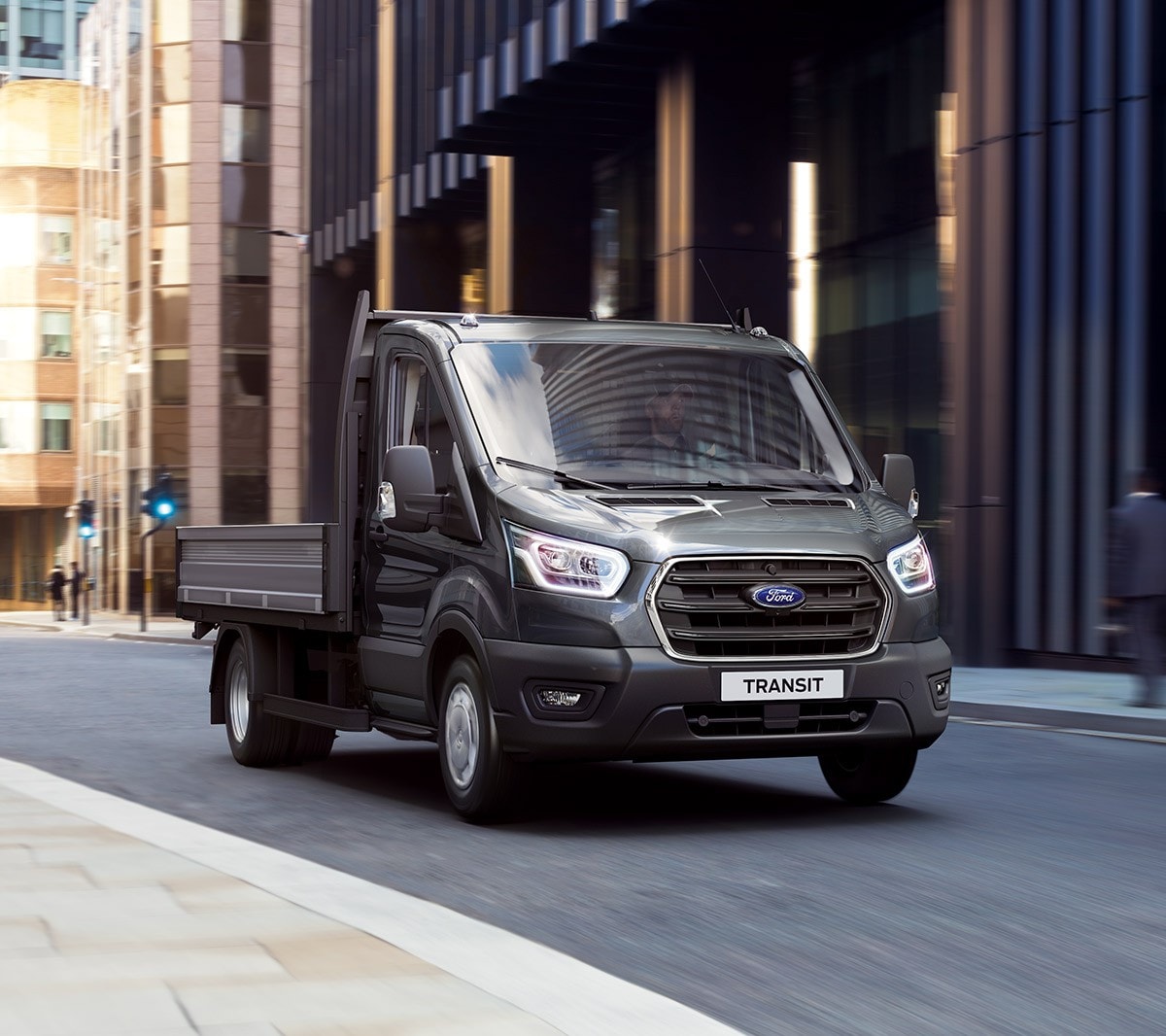 New Ford Transit Chassis Cab driving on road