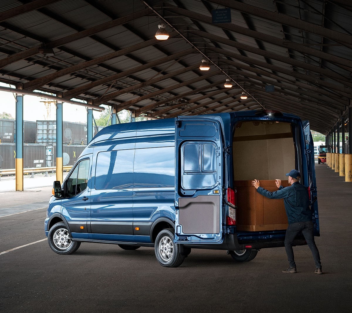 Ford Transit Van rear view with man loading