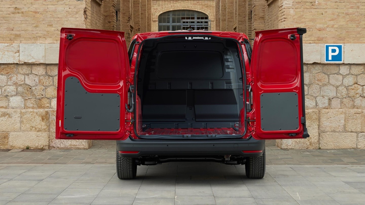 Ușile deschise prezintă peretele despărțitor al noului model Ford Transit Connect în culoarea Maple Red.