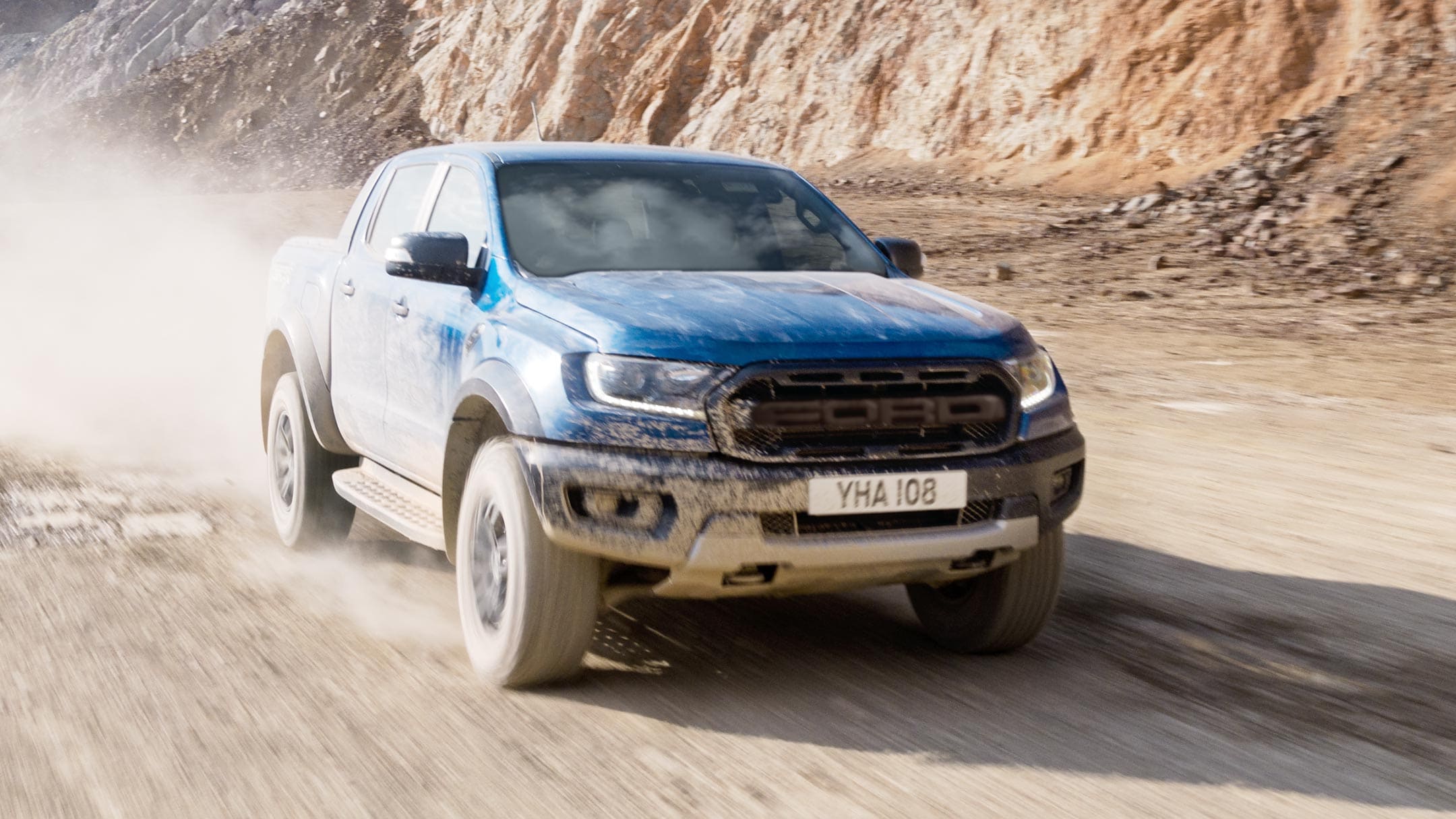 Ford Ranger Raptor riding on the mud