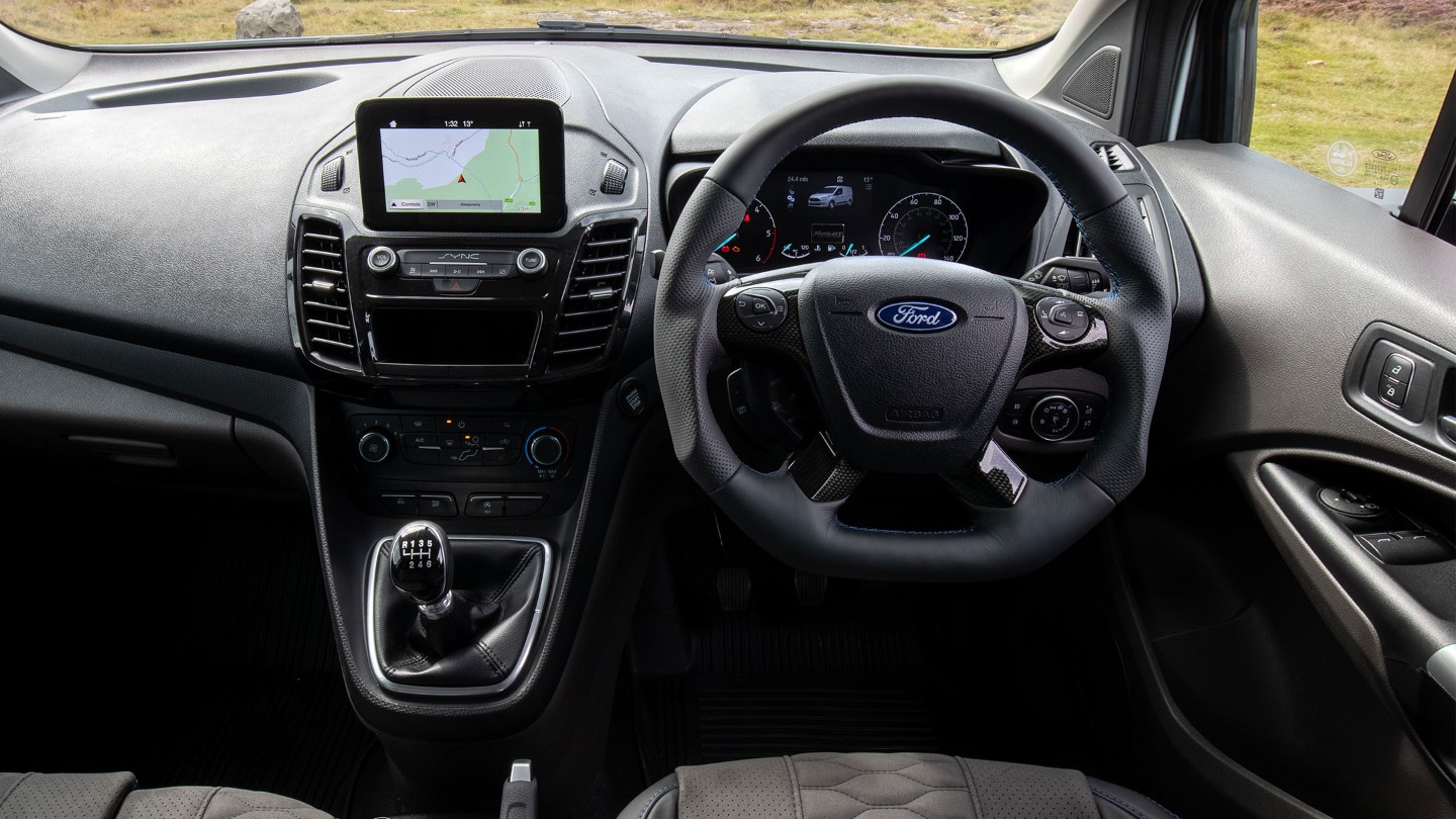 Interior view of the Ford Transit Connect MS-RT showing the steering wheel and dashboard