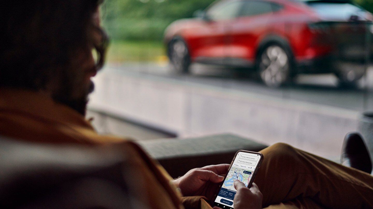 Man with mobile planning a trip