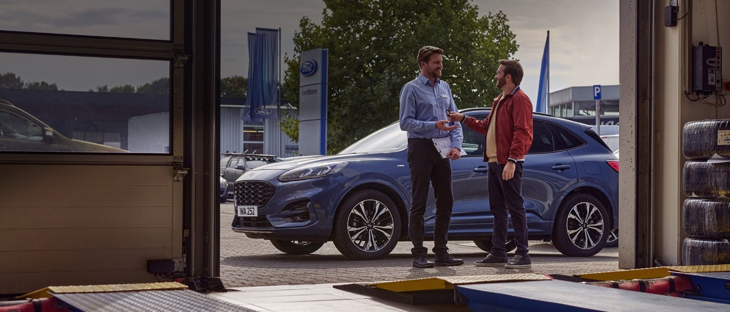 Ford technician and customer