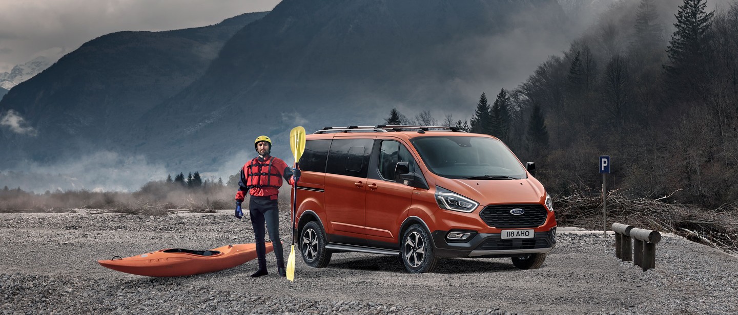 Two Ford commercial vehicles standing on construction site